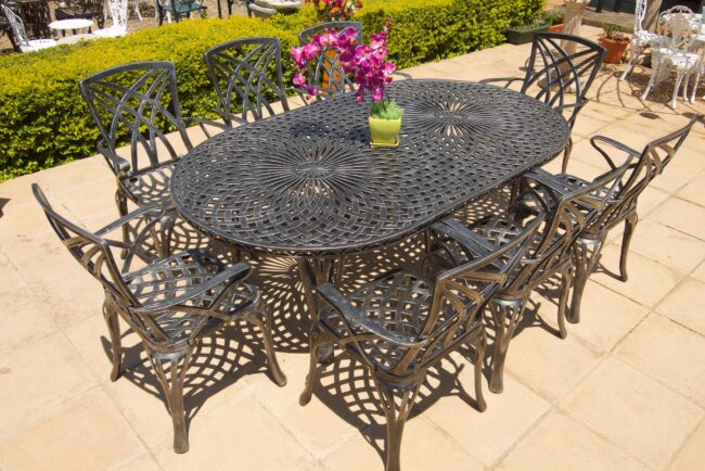 Eight-Seater Cast Aluminium Patio Furniture Willow Set with 219cmx125cm Oval Crystal Table